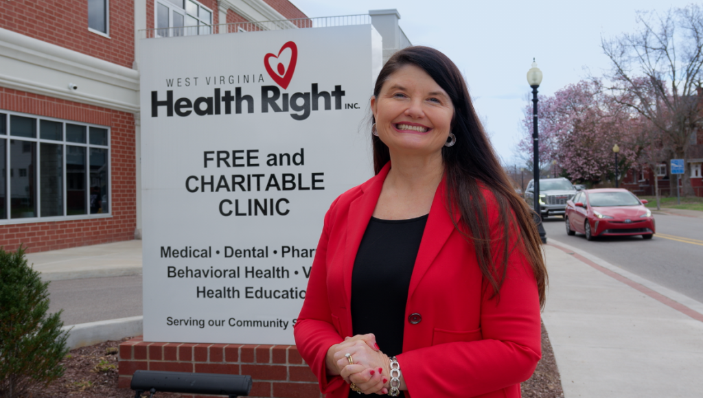 West Virginia Health Right CEO standing outside the free and charitable clinic sign in Charleston, West Virginia.